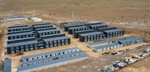 Vast Middle East mining farm bustling with numerous mining machines and hosting infrastructure